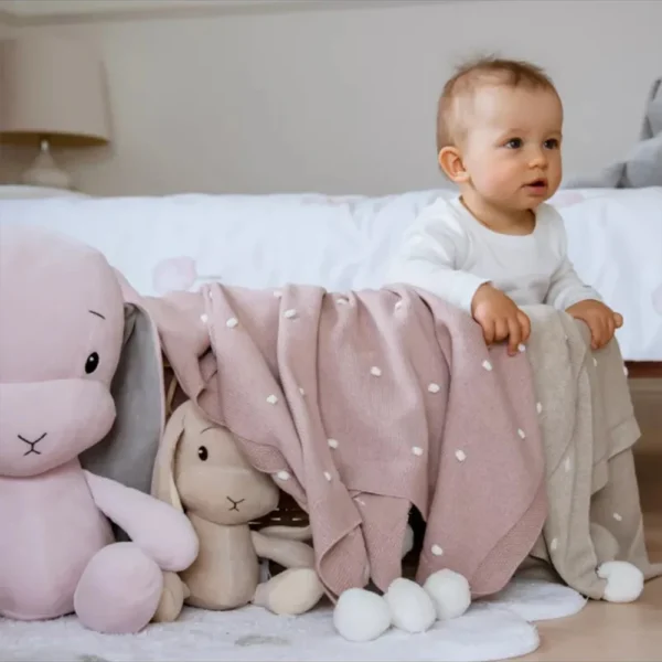 Տրիկոտաժե վերմակ պոմպոններով Effiki